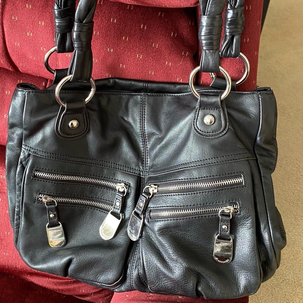 B. Makowski black leather bag.